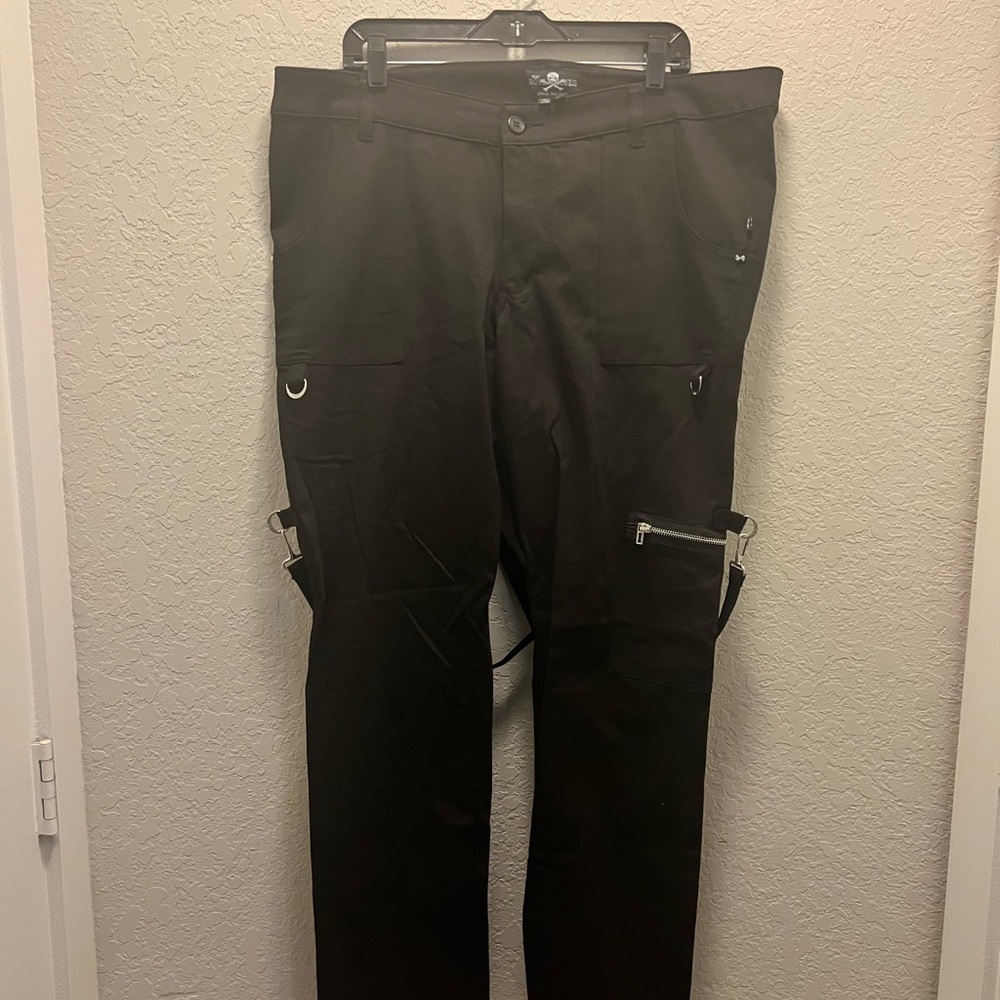 Black, buckle like trapp pants.